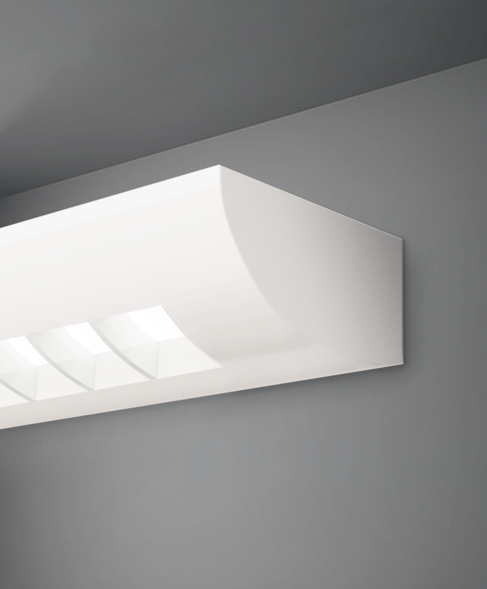 Alcon 11112, surface mount linear wall light line drawing shown in white with a curved louvered lens.