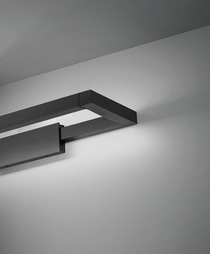 Alcon 11701, surface mount linear wall light line drawing shown in black with rotating slim rectangular lens