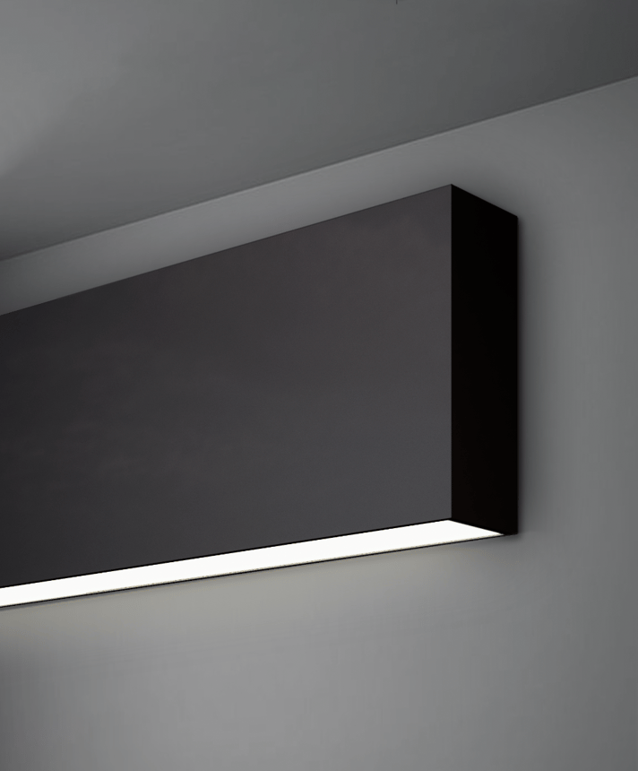 Alcon 12100-14-W, surface mount linear wall light line drawing shown in black  with a flush rectangular bottom lens. 