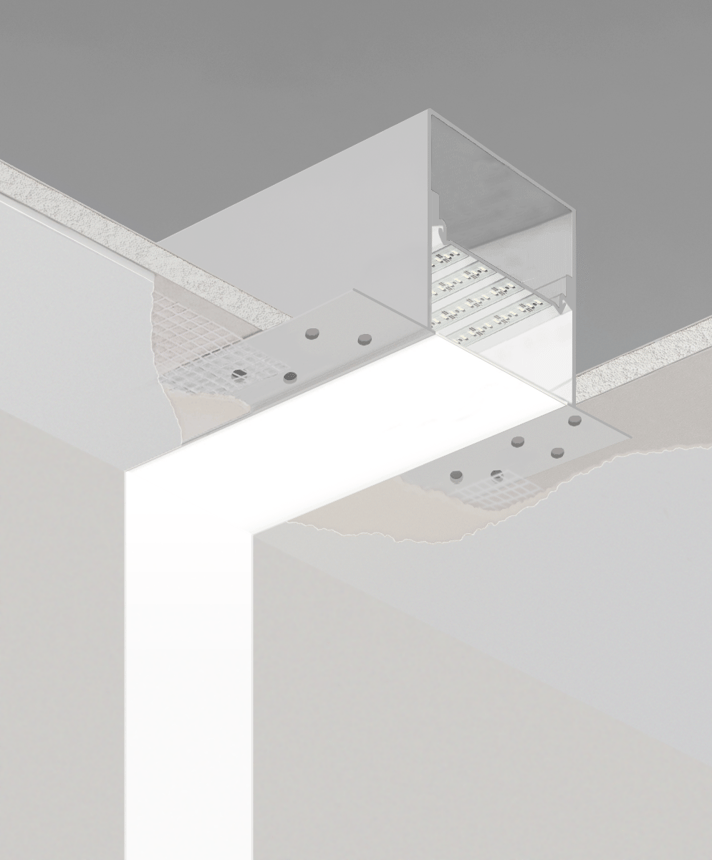 Alcon Lighting's 12100-40-R-CW recessed linear ceiling-to-wall light shown in a white finish and with a flush trimless lens.