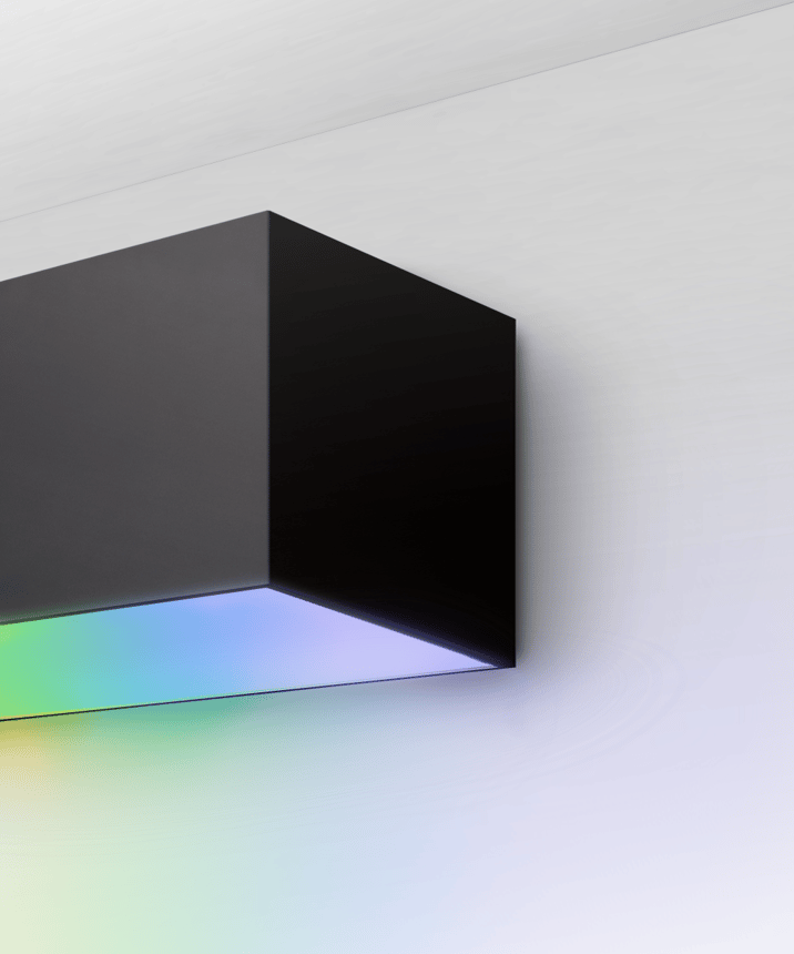 Alcon 12100-40-W-RGBW, surface mount linear wall light shown in silver finish and with a flush trim-less bottom and top lens.