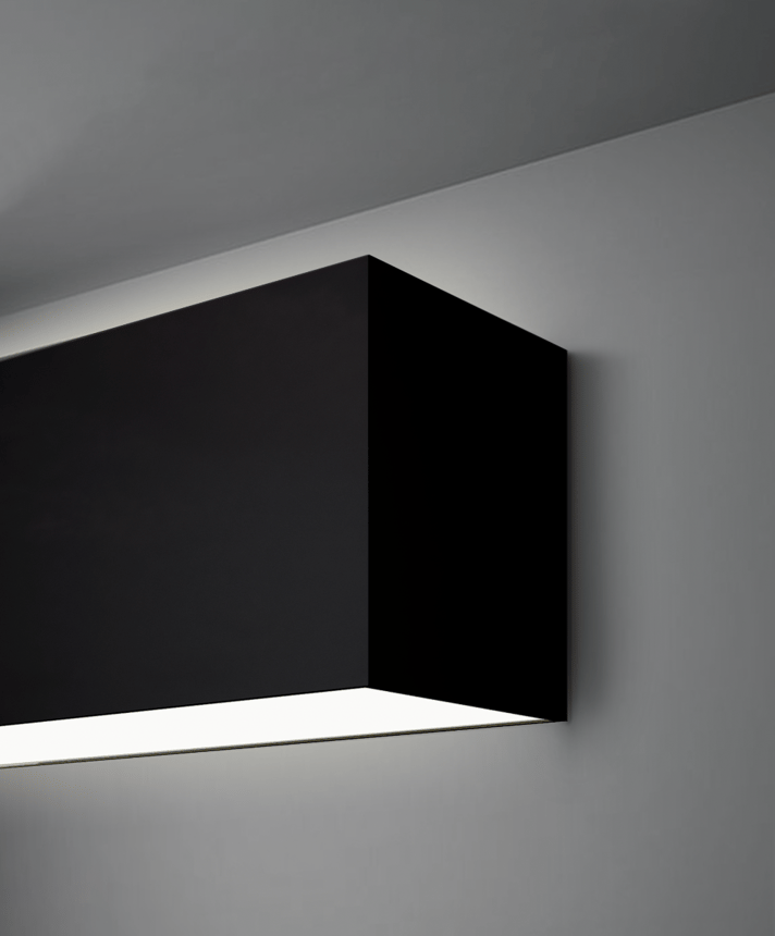 Alcon 12100-66-W-WW, surface mount linear wall light shown in black finish and with a flush trimless top and bottom lens for uplighting and downlighting