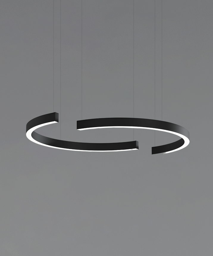 Two 12258 half-circle pendant lights, shown with a black finish and flush trimless lens.