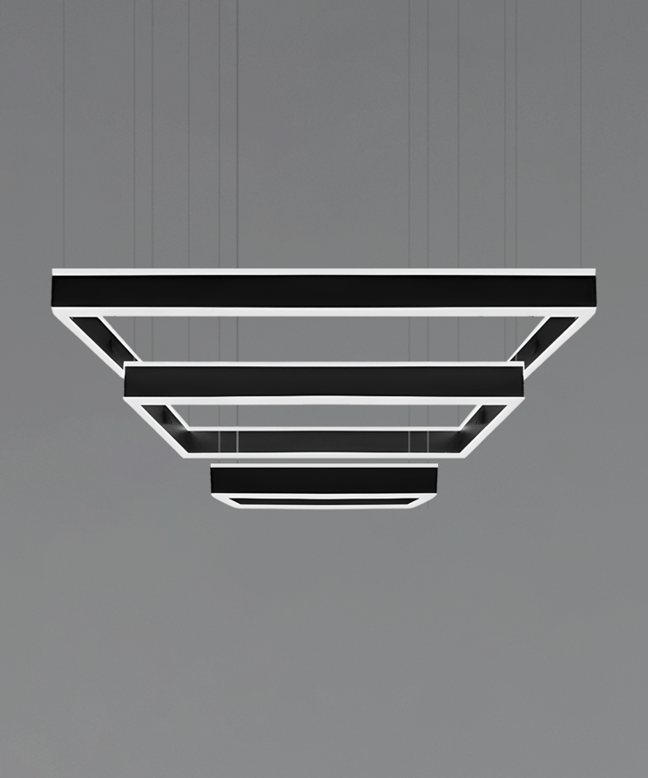 Alcon 12274-3-P, three-layered tiered suspended commercial rectangular pendant light shown in black finish and with a flush trim-less lens.