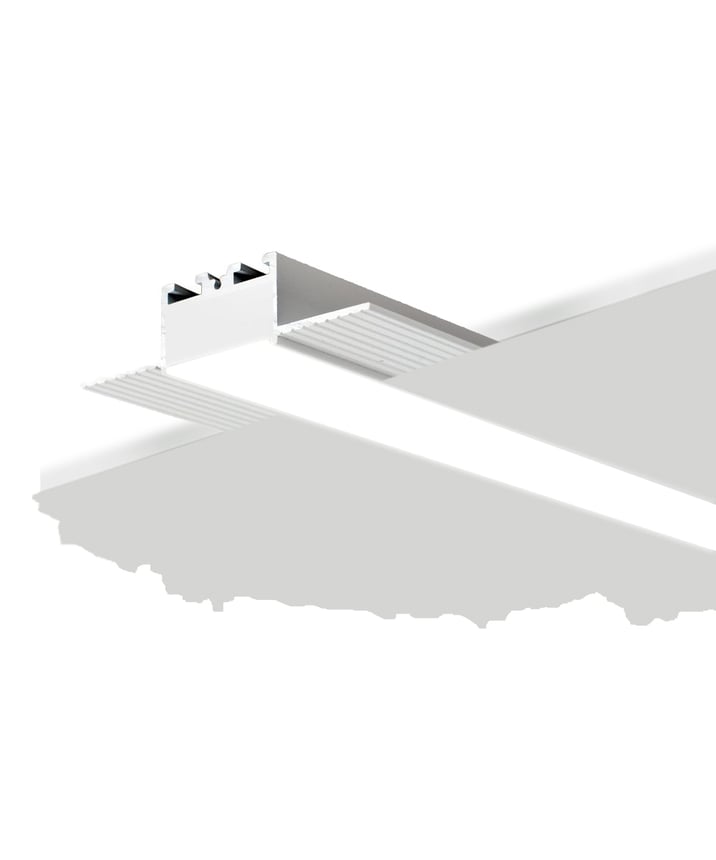 12100-10-R-LR recessed low-rise linear ceiling light by Alcon Lighting, shown in silver finish and with a flush trimless lens

