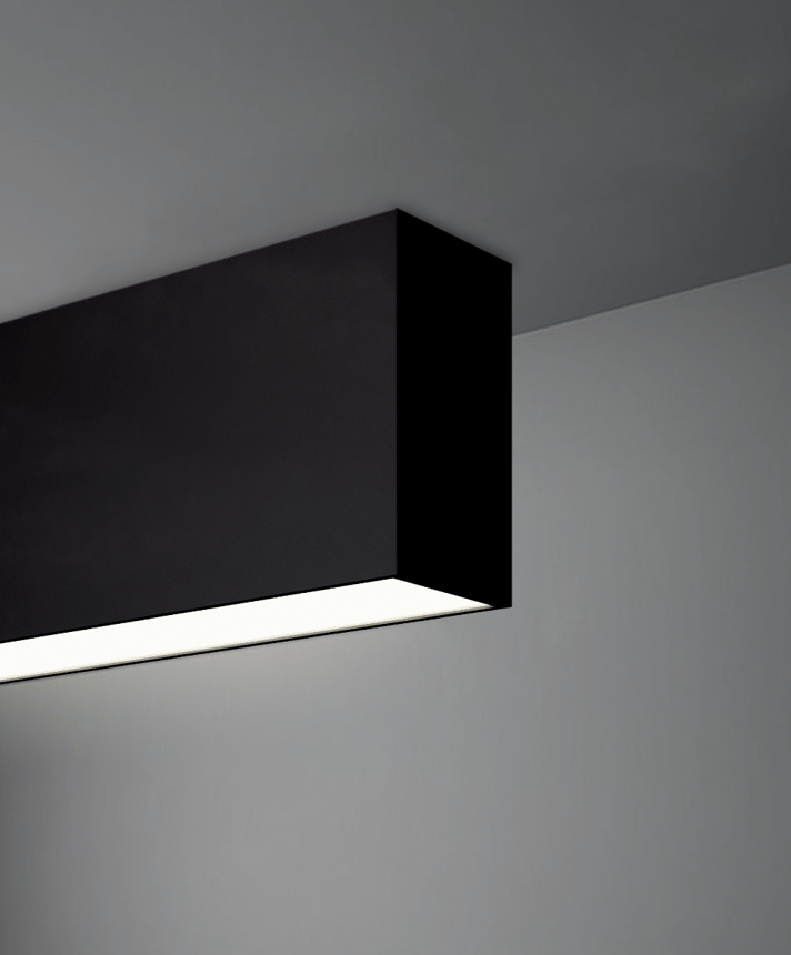 Alcon 12100-20-S, surface linear ceiling light shown in white finish and with a flush trim-less lens.