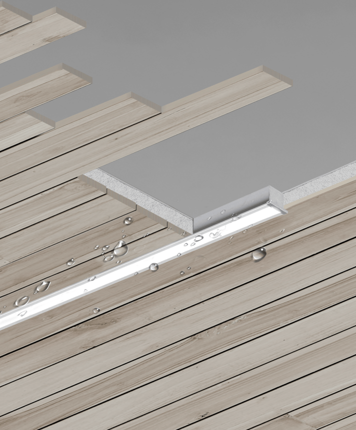 Alcon Lighting's 12100-8-R recessed linear wet location ceiling light shown in a silver finish with a flush lens.