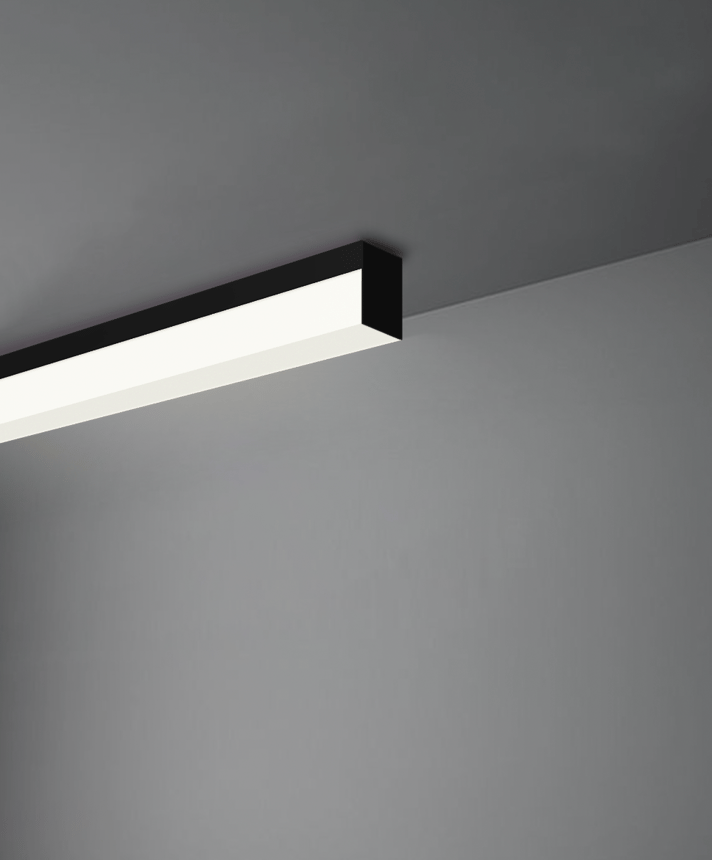 Alcon 12100-8-S, surface linear ceiling light shown in silver finish and with a flush trim-less lens.