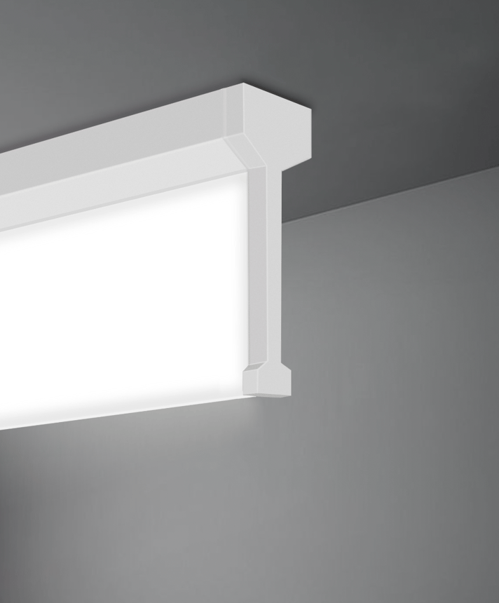 Alcon 12139-S, surface linear ceiling light shown in white finish and with a center trim-less lens.