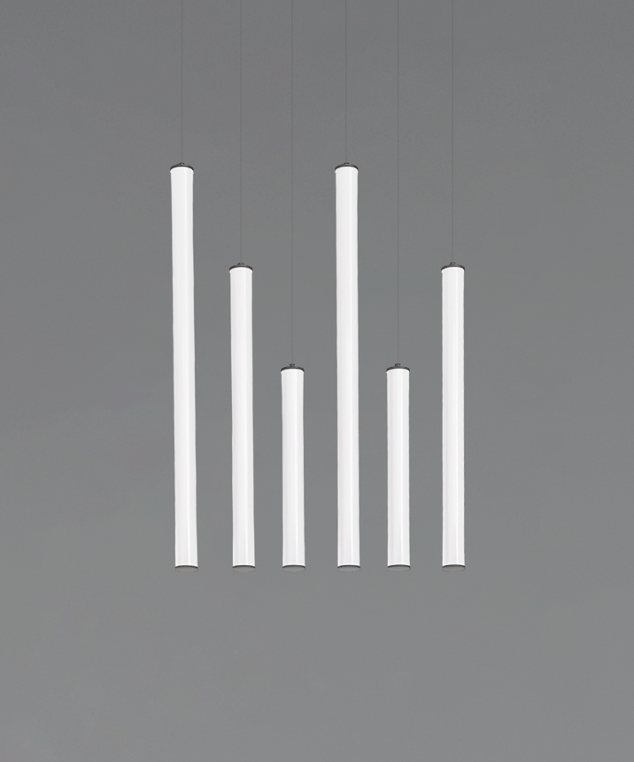 Alcon 12146-6L Suspended commercial vertical cylinder pendant shown with slim black end caps and 360 wrapping illuminated lens. Shown as a 6 tube linear modern pendant set at various lengths