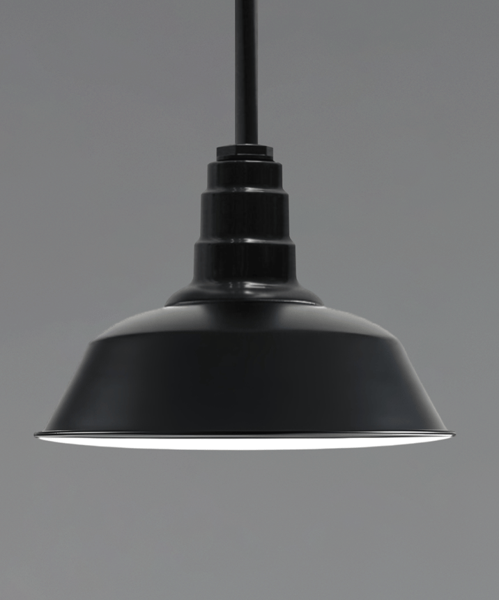 Alcon 15207, suspended commercial pendant light shown in black finish and with a tapered dome shaped open-lens housing.