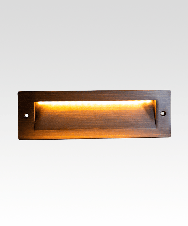 Alcon 9214 wide rectangular LED step light showed in natural bronze