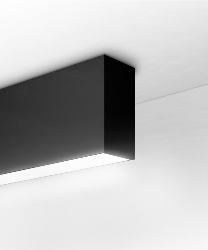Alcon 12100-20-S, surface linear ceiling light shown in white finish and with a flush trim-less lens.