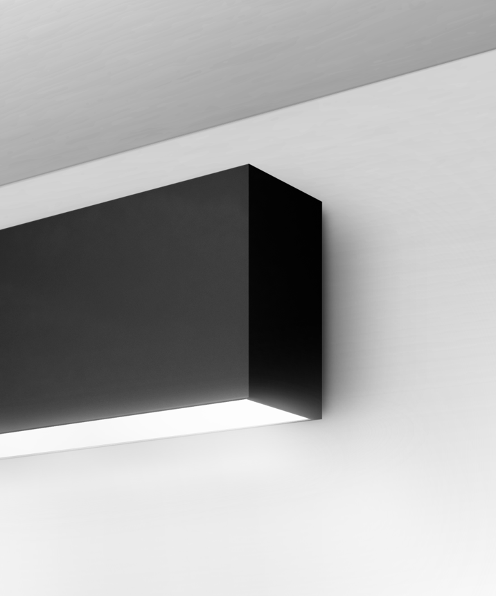 Alcon 12100-20-W, surface mount linear wall light shown in silver finish and with a flush trim-less bottom lens.