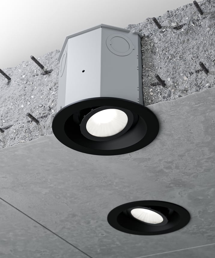 Alcon 14105-4-ADJ Round Adjustable LED Recessed Concrete Ceiling Light with Beveled Trim shown in a Black finish