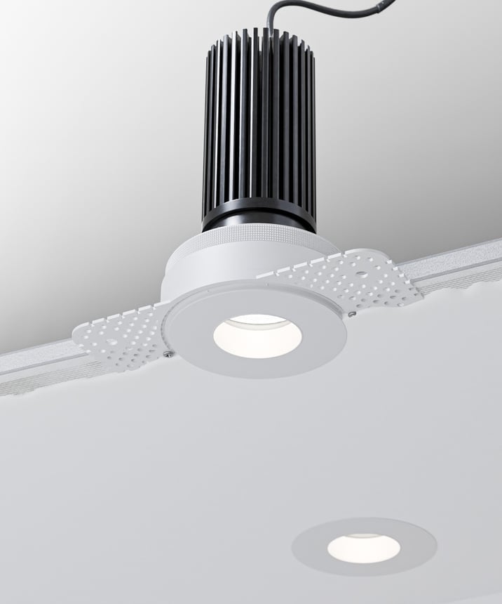 Alcon 14119-3ND-TL Recessed Adjustable Downlight Round Trimless Pinhole shown with a round White trim and White reflector finish