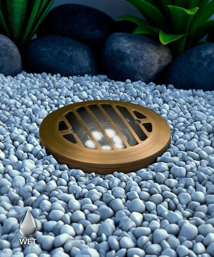 Alcon 9015 Low-Voltage 6-Inch In-Ground LED Well Light shown in a bronze finish.