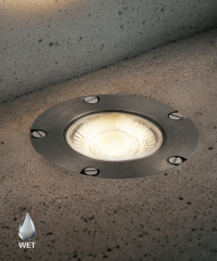 Alcon 9026-SS Low-Voltage 5-Inch Adjustable In-Ground LED Well Light shown in a stainless steel finish.