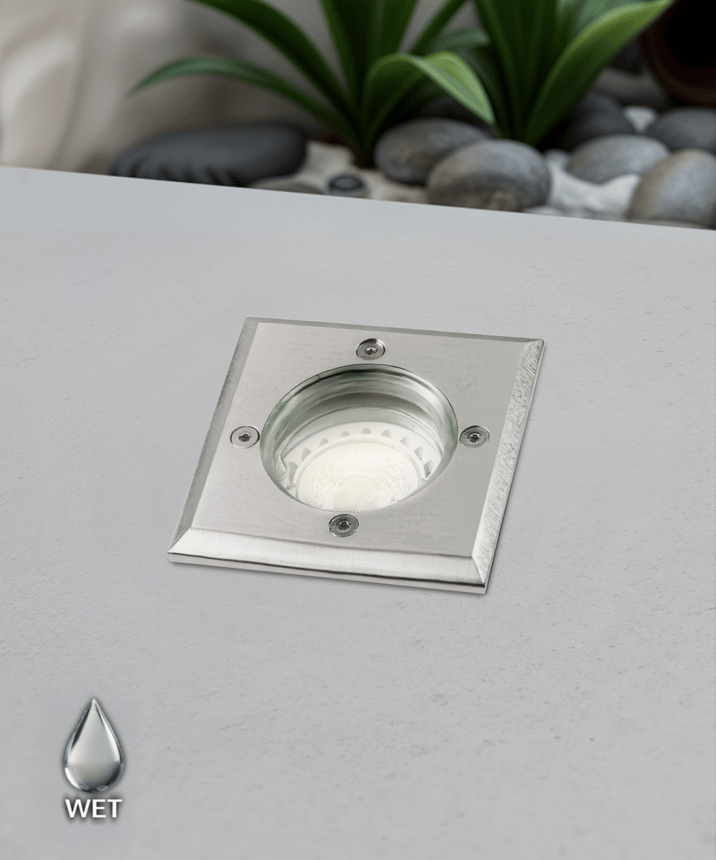 Alcon 9040 Low-Voltage 4-Inch In-Ground LED Well Light shown in a stainless steel finish.