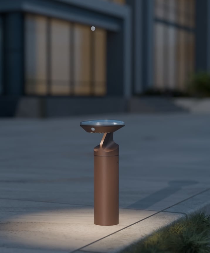 Alcon 9035-TRI 40-inch tri-arm commercial LED bollard light on exterior shown in a bronze finish.