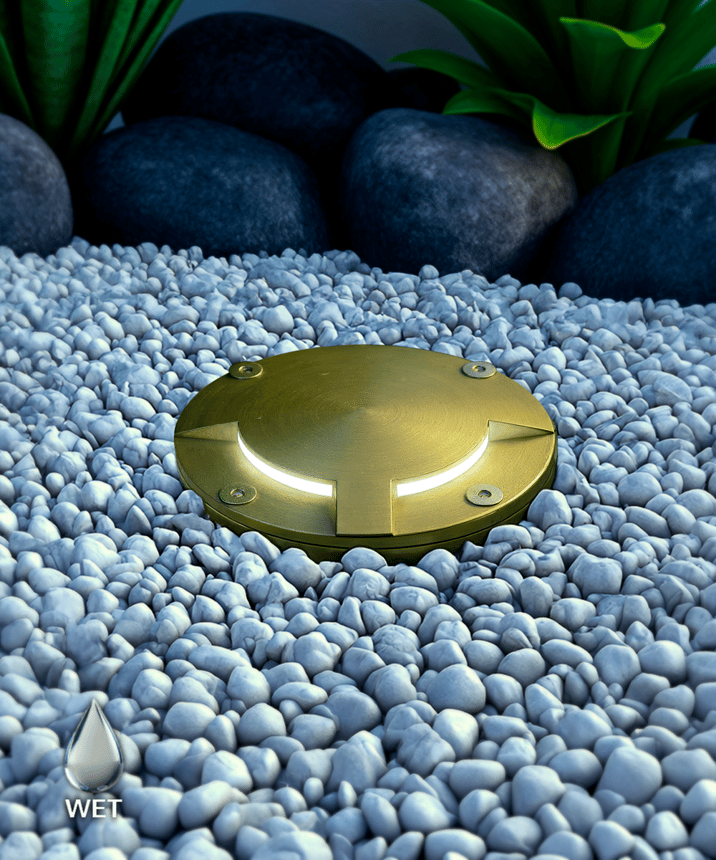Alcon 9150-D90 4-Inch In-Ground LED Well Light | Dual 90° Beams shown in a cast brass finish.
