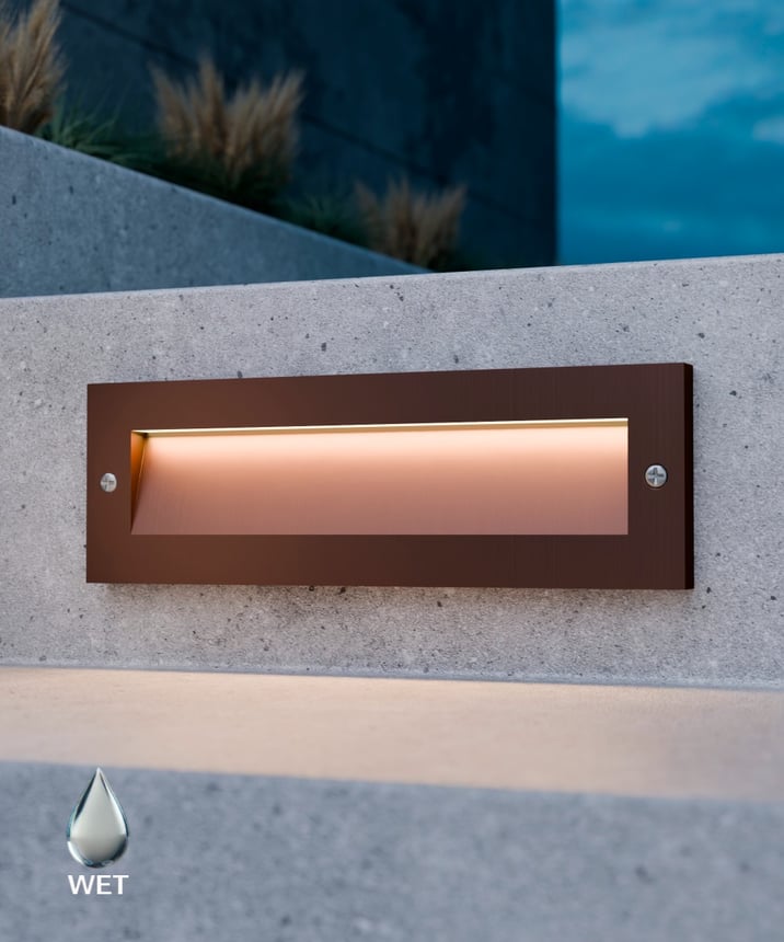 Alcon 9214 wide rectangular LED step light showed in natural bronze