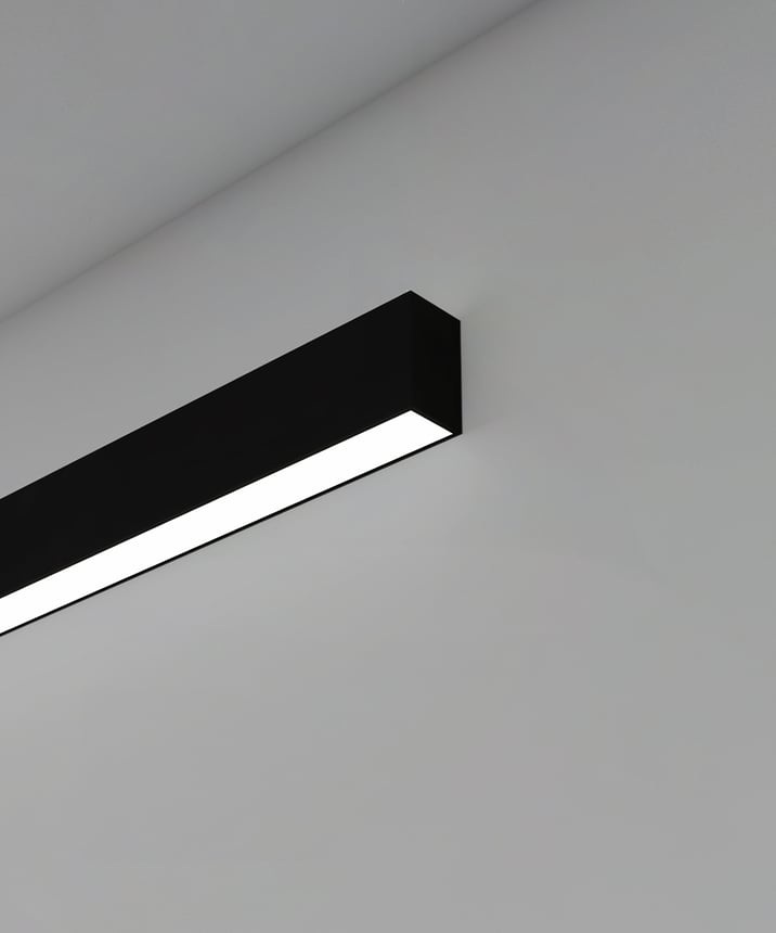 12100-12-W linear LED wall light shown with black finish and diffuser lens