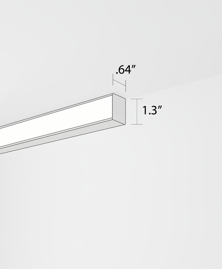 Alcon 12100-6 surface linear ceiling light shown in black finish and with a flush trim-less lens.
