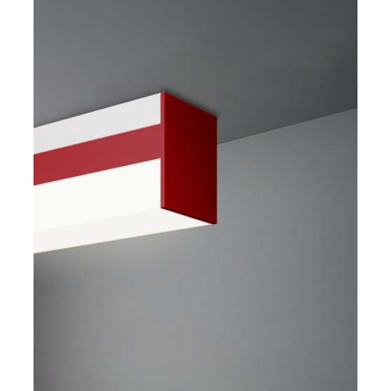 Alcon 12100-2-S, surface linear ceiling light shown in red finish and with a wrapping squared lens.