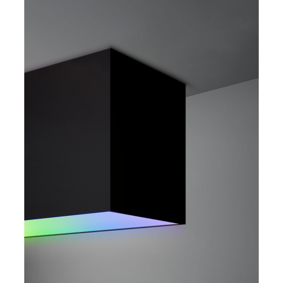 Alcon 12100-66-S, surface linear ceiling light shown in black finish with a flush trim-less lens, and color changing capabilities.