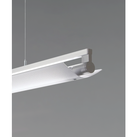 Alcon 12160-P-PDI, suspended linear pendant light shown in silver finish and with a wide curved perforated bottom lens.