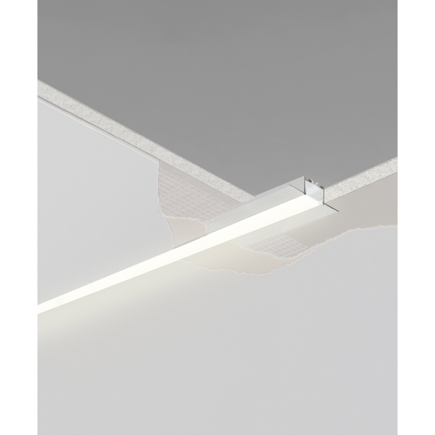 12100-10-R recessed linear ceiling light by Alcon Lighting shown in silver finish and with a flush trimless lens