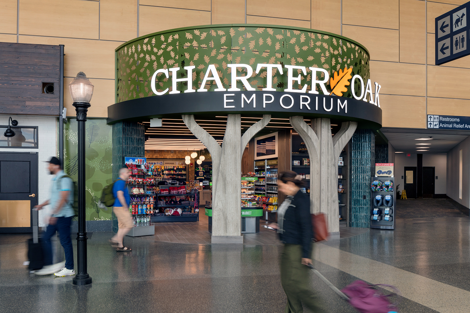 The brightly lit Charter Oak Emporium storefront at space #A268 in the Bradley International Airport brings nature indoors.