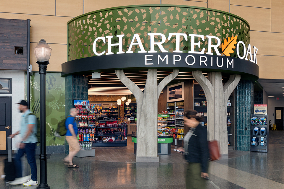 The brightly lit Charter Oak Emporium storefront at space #A268 in the Bradley International Airport brings nature indoors.